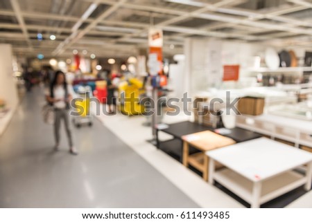 Blurred background : inside of the furniture shop in shopping mall