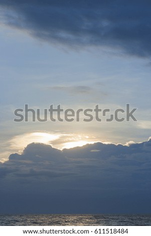 Sunset behind cloud beach 