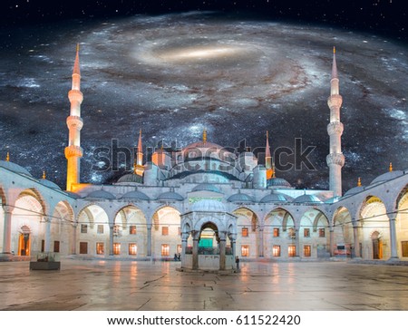 Blue Mosque (Sultanahmet Camii) against  barred spiral galaxy milky way at dusk, Istanbul, Turkey. Elements of this image furnished by NASA
