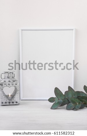 Frame mockup, vintage candle holder, branches of green eucalyptus on white background, styled, branding, social media