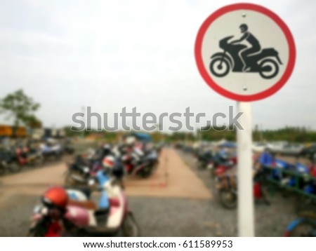 Road sign for parking motorbikes only. Motorcycle Parking Area in Thailand. Blurred Style background.