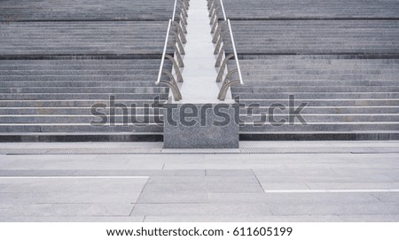 Symmetrical stairs to the street, in the city