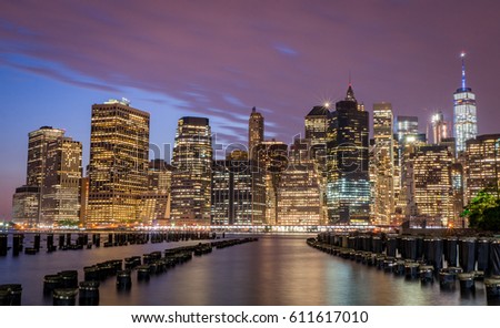 Night view at skyscrapers in Lower Manhattan taken from across the river, New York City, USA