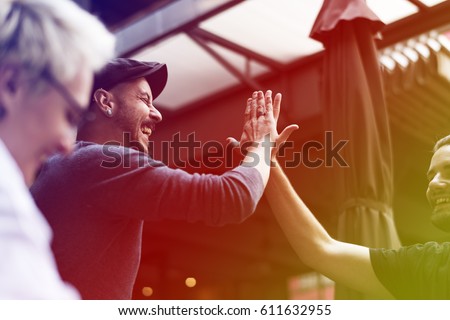 Group of people meeting and high five Royalty-Free Stock Photo #611632955