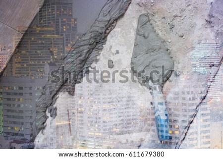 construction equipment double exposure with city picture