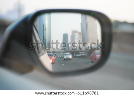 Picture blurred  for background abstract and can be illustration to article of side rear view mirror on a car