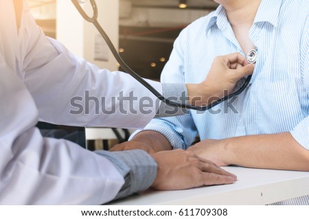 Doctor check body by stethoscope Royalty-Free Stock Photo #611709308