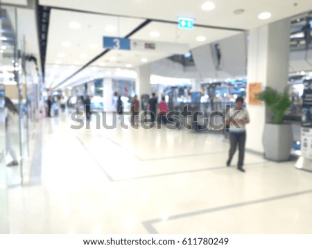 Abstract blur beautiful luxury shopping mall and retail store interior for background - can be used for display or montage your products