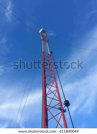wireless communication repeater tower in summer sky 