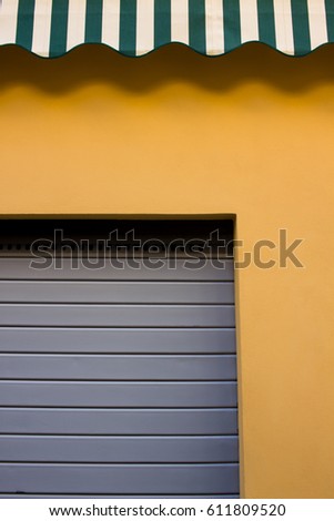 Wall of italian shop in Belagio. Abstract composition