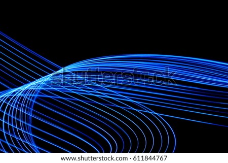 Blue Light Painting Photography loop on a black background