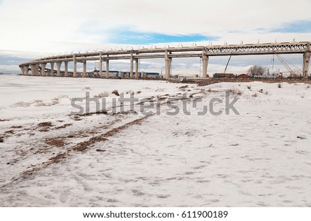 Highway near frozen lake
