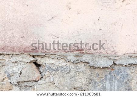 Old wall with several layers of paint