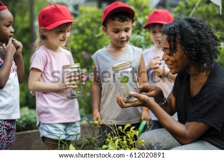 Teacher and kids school learning ecology gardening Royalty-Free Stock Photo #612020891