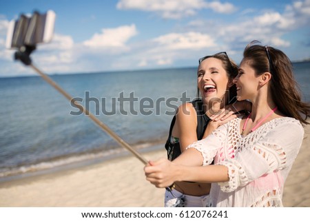 Friendly selfie on beach