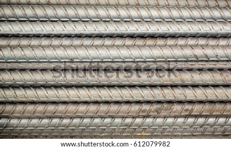 Close up steel bar in construction site, steel bar texture, reinforcement for cement/concrete layer. Strong Element of construction concept.