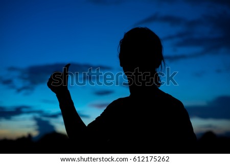 Silhouettes human are showing sign of hands.