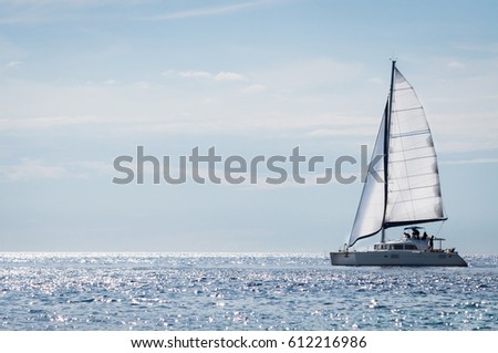 Yacht catamaran on the sea Royalty-Free Stock Photo #612216986