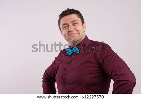  Cheerful man in shirt with butterfly, tie
