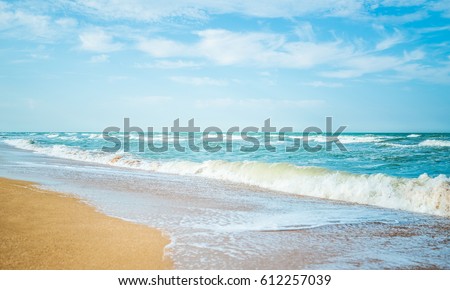 Sea view from tropical beach with sunny sky. Ocean beach relax, outdoor travel. Summer paradise beach of Azov. Royalty-Free Stock Photo #612257039