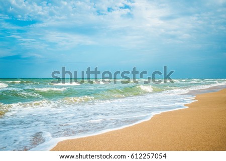Sea view from tropical beach with sunny sky. Ocean beach relax, outdoor travel. Summer paradise beach of Azov. Royalty-Free Stock Photo #612257054