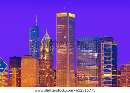 Skyline of downtown Chicago, Illinois, USA with skyscraper office buildings at twilight.