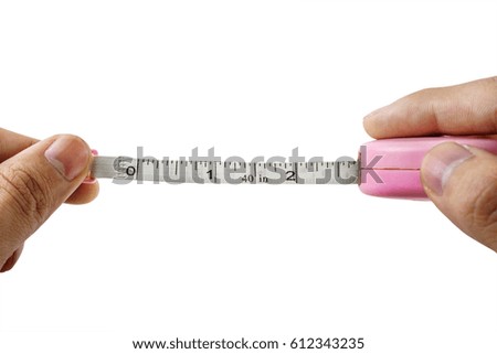 close up hand with Pink Heart measuring tape isolated on white background with clipping path.selective focus