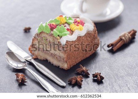 Birthday sweet cake on a black stone table