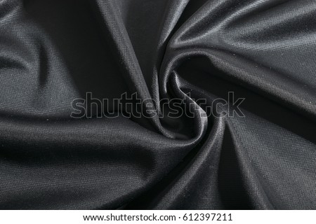 Fashion elegant dark fabric, black textile background.  Royalty-Free Stock Photo #612397211