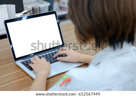 Cropped image of a youngGirl working on his laptop in a office shop, rear view of business man hands busy using laptop at office desk, young girl Engineer typing on computer sitting at wooden table