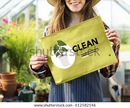 Farmer woman holding go green banner