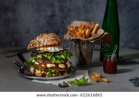 Foodporn Beef Burger with Chips and Sparkling Water, Junk Food, copy space for your text Royalty-Free Stock Photo #612616865