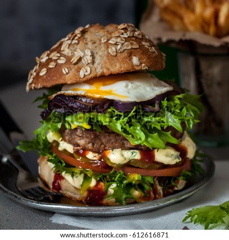 Foodporn Beef Burger with Chips and Sparkling Water, Junk Food, square Royalty-Free Stock Photo #612616871