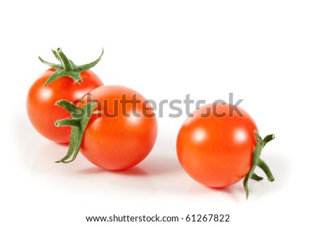 Random Organic Cherry Tomatoes Isolated on White Background Royalty-Free Stock Photo #61267822