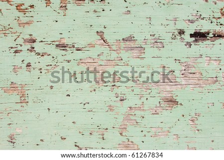 Flaking Green Paint on Faded Wood Background Royalty-Free Stock Photo #61267834