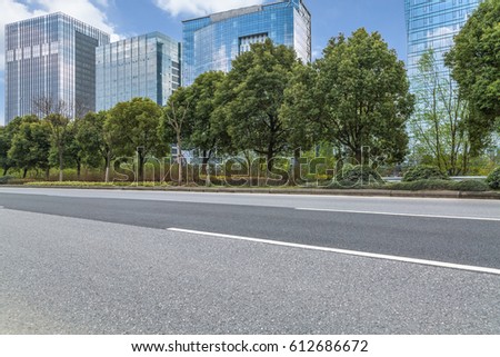 clean urban road with modern building in the city
