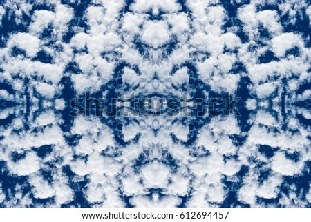 Azur blue sky with small white cumulus clouds. Cirrocumulus cloud also known as puffy, cotton-like or fluffy, symmetry image for nature background, kaleidoscope, meditation, religious website