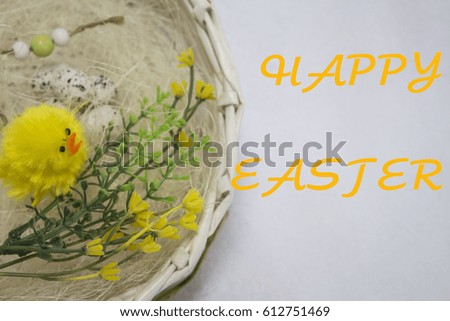 Wicker basket with quail eggs,shavings, chicken,willow twig and bird on the white background. happy easter card, 