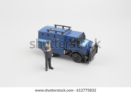the Miniature people safety concept police and thief on white background
