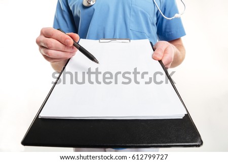 Male Doctor's hand holding a pen and clipboard with blank paper and stethoscope isolated on white background