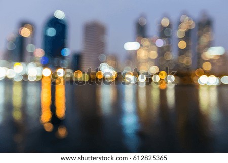 Night blurred bokeh light city office building, abstract background