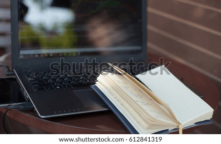 notebook , pen , computer on table for working
