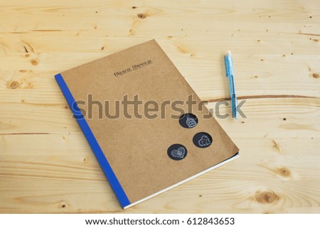 NOTEBOOK and a PEN 