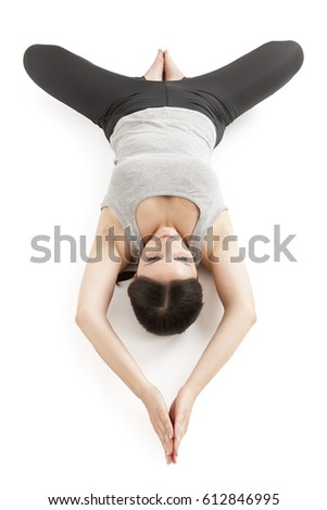 Yoga woman gray_supta baddha konasana_upside down