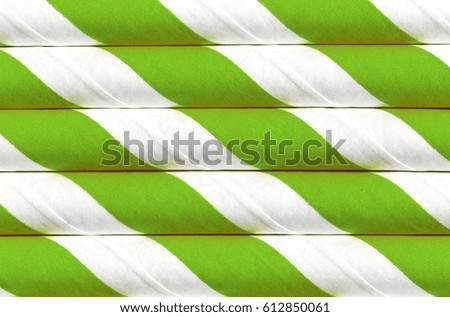 Abstract background, interesting paper tubes green pattern macro