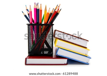 books and pencils on a white background