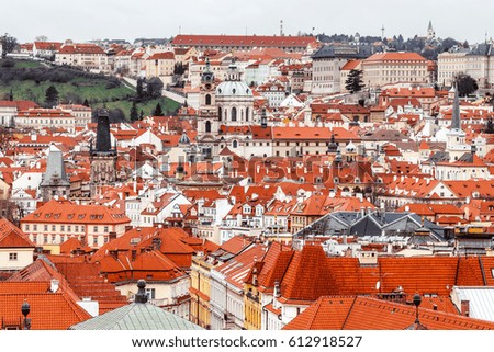 houses with red roof is a famous landmark of the Prague, aerial view from above