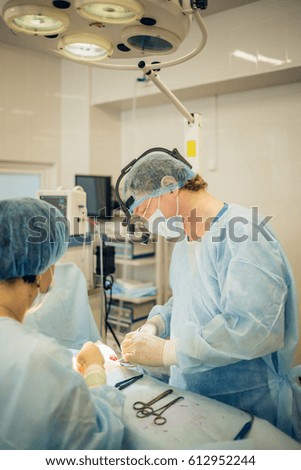 portrait of Surgeon operating live shot