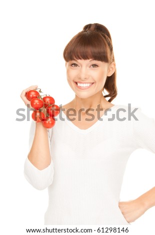 picture of young beautiful woman with ripe tomatoes