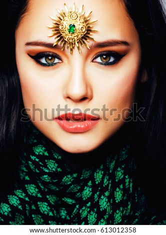 beauty eastern real muslim woman with jewelry close up, bride wi